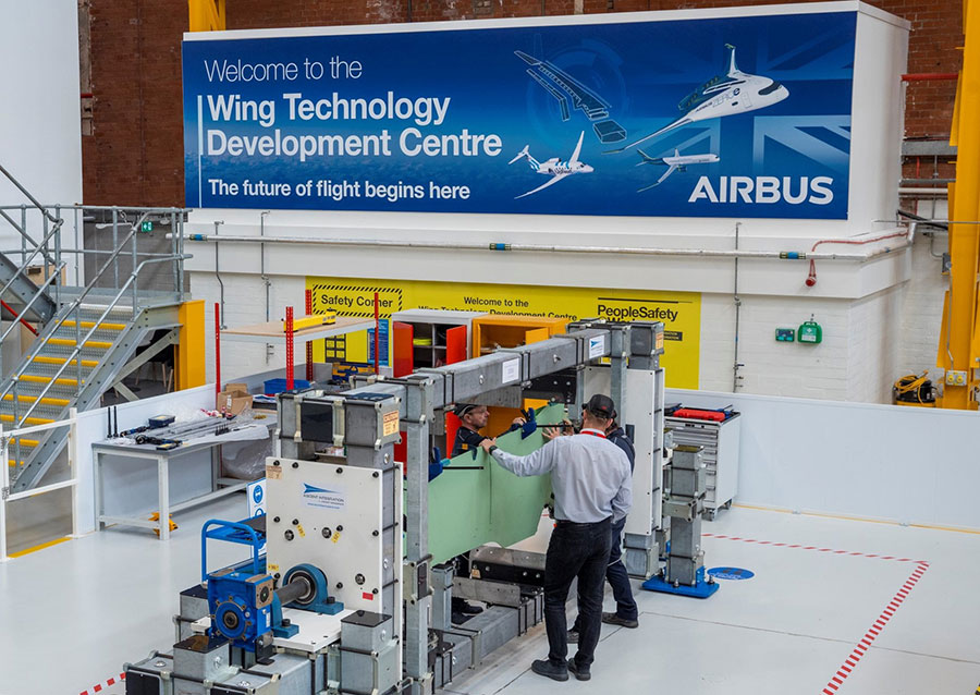 Photo showing inside of an aircraft component development facility.